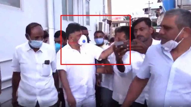K'taka Congress President Caught Slapping A Man For Putting His Arm Around Him