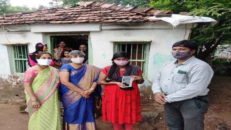 Warangal Collector Gifts Smart Phone to Poor Student