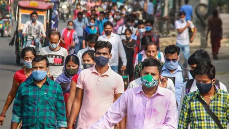Wear Masks, Officials Tell People As COVID Cases Surge