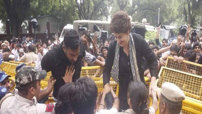 Priyanka Gandhi jumps over police barricades as Congress protest rages