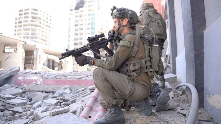 Israel raids the Al Shifa Hospital, urges Hamas to surrender