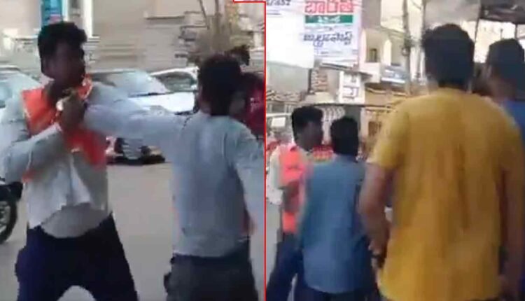 Coconut Seller Throws Rocks at GHMC Workers