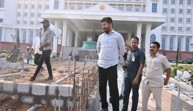 CM Revanth Reviews Ongoing Works For Telangana Talli Statue Installation