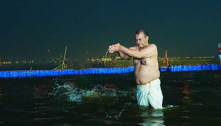 Minister Komatireddy Takes Holy Dip At Maha Kumbh Mela