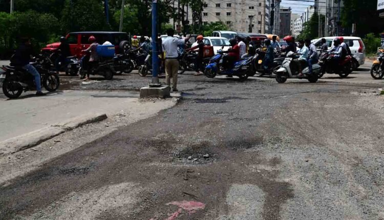 Battered Roads In Hyderabad Frustrated Commuters, GHMC Apathy Worsen Woes