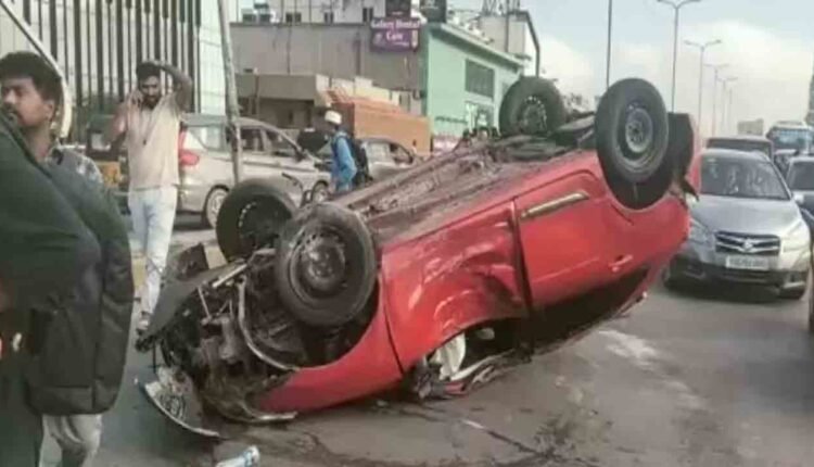 Speeding Car Overturns After Hitting Divider And Two-Wheeler At JNTU Bridge