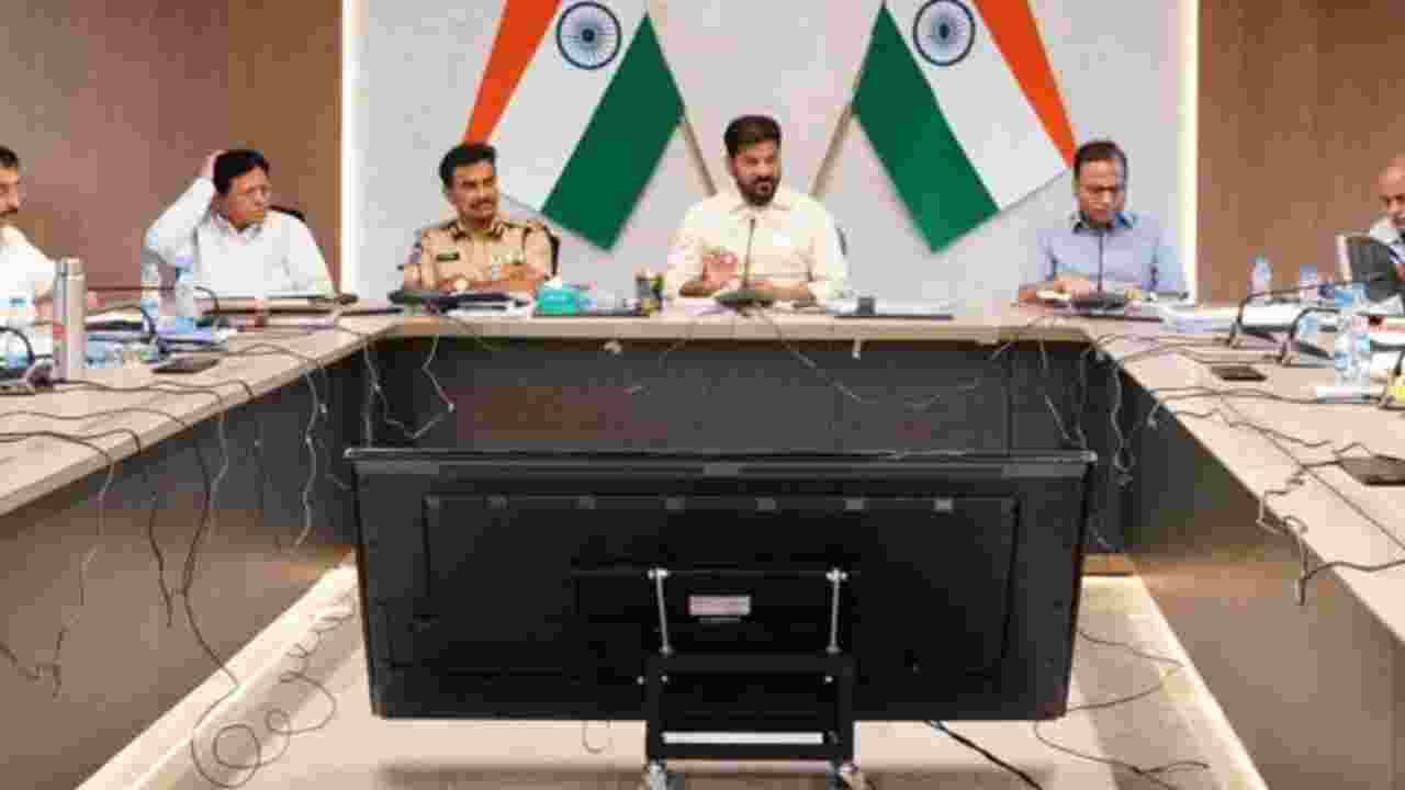 Revanth Reddy Warns Officials Over Hyderabad Rain Traffic Chaos