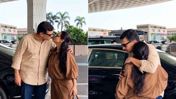 Vidya Balan Siddharth Roy Kapur Share Kiss At Airport